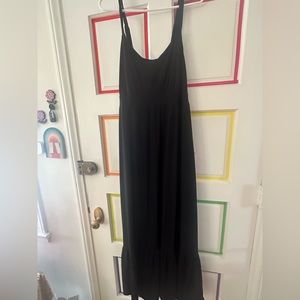 Torrid black maxi dress. Super comfortable Adjustable straps ripped hem
